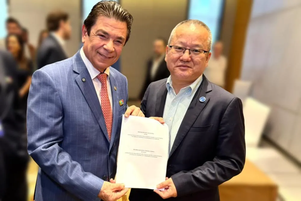  A assinatura aconteceu durante encontro empresarial realizado na cidade chinesa de Guangzhou. (Foto: Reprodução).