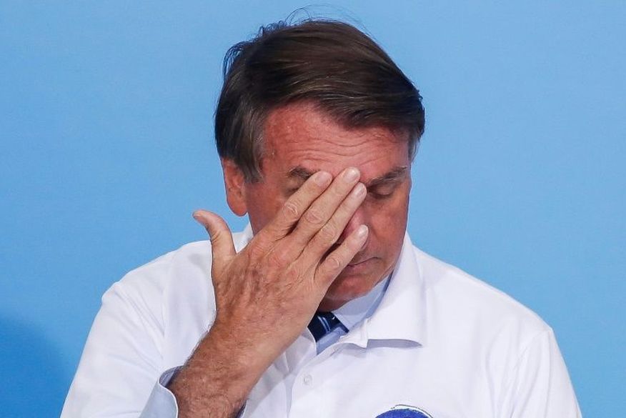 O presidente Jair Bolsonaro durante cerimônia no Palácio do Planalto, em Brasília, em 12 de janeiro de 2021. (Foto: AFP)